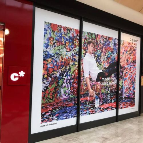 Pose adhésif sur façade magasin CELIO